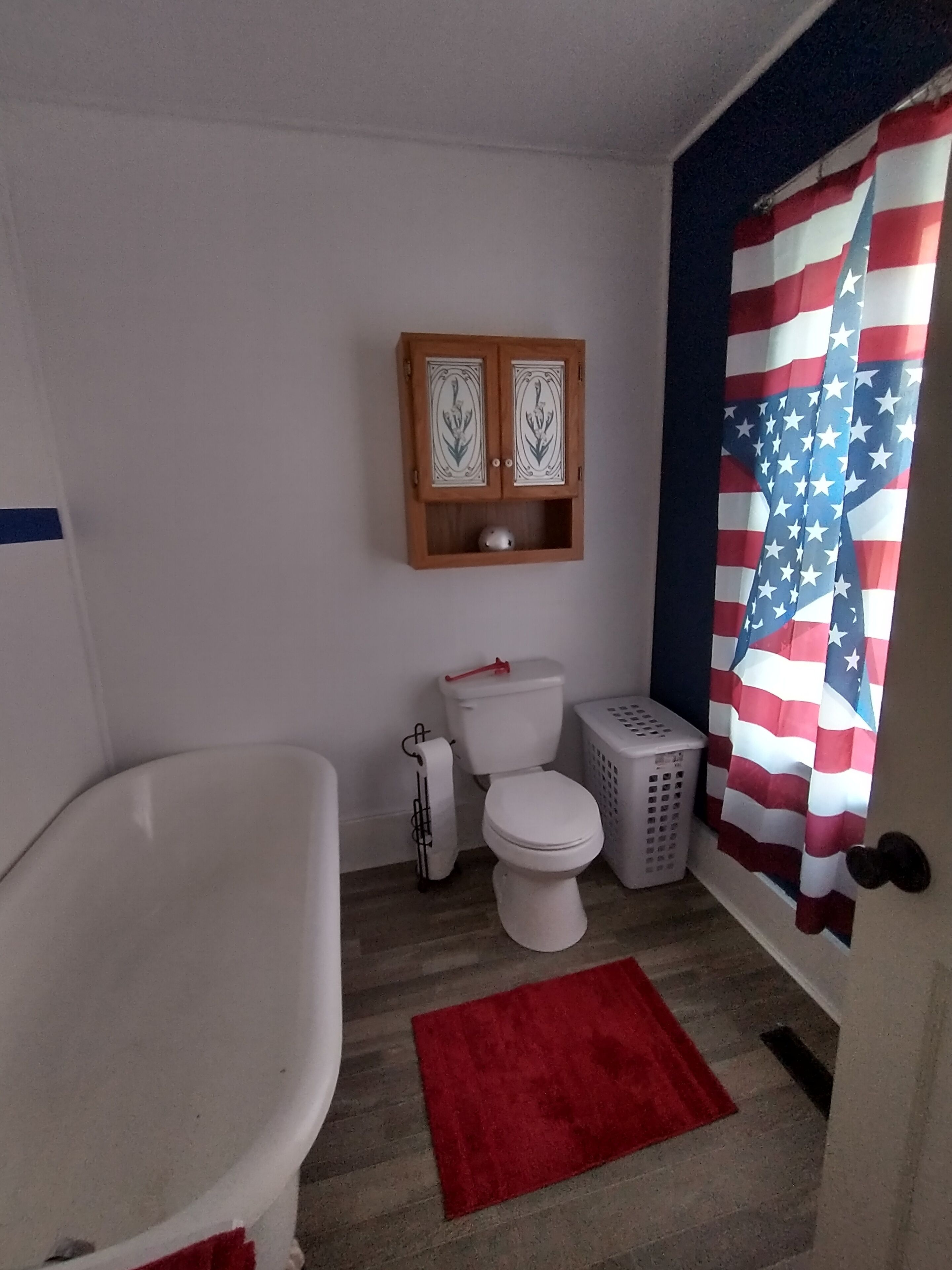 Combined shower/tub, hair dryer, towels, soap