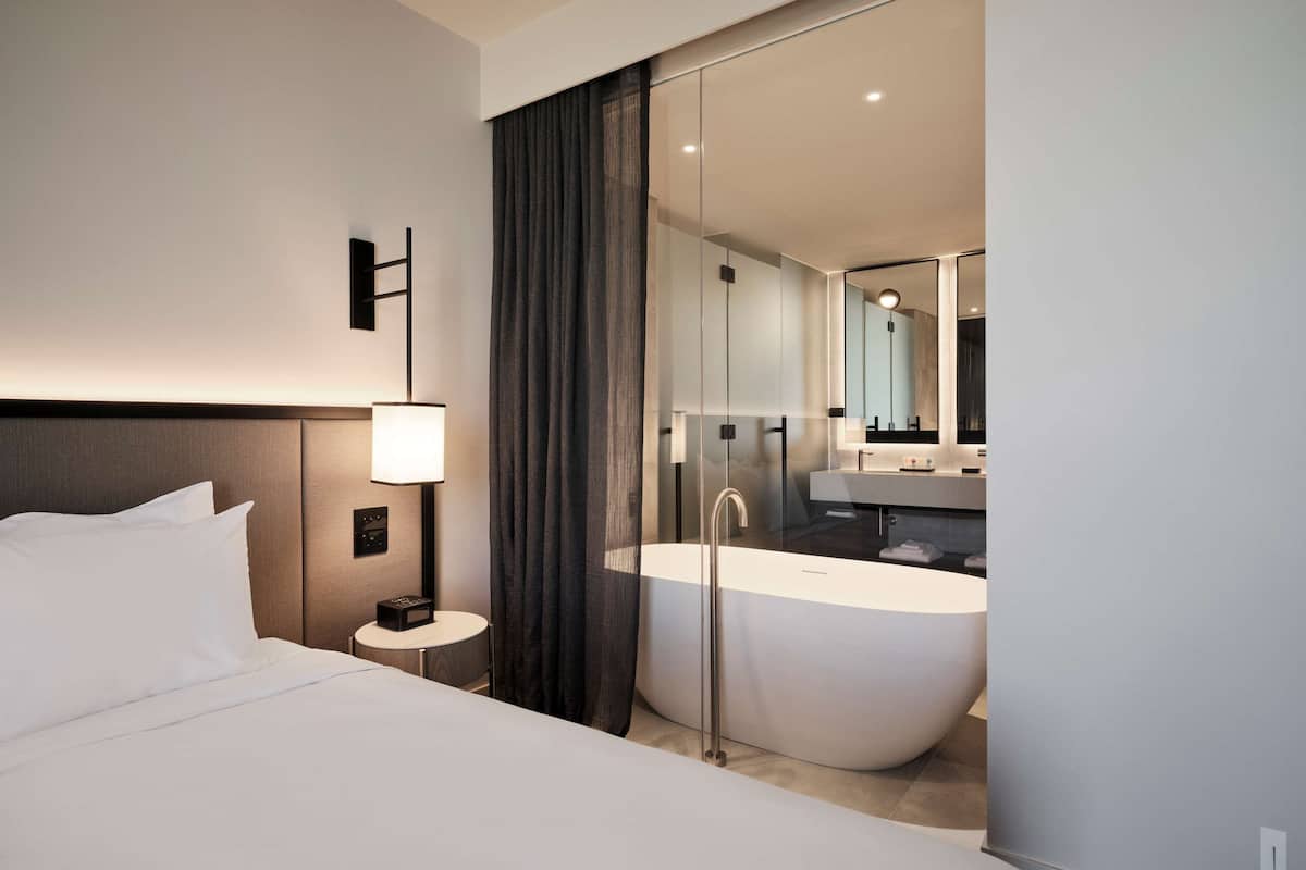 suite, 2 bedrooms | bathroom | shower, rainfall showerhead, designer toiletries, hair dryer