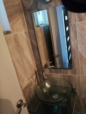 Shower, towels, soap, toilet paper