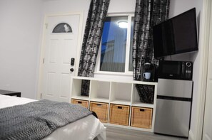 1 habitación, tabla de planchar con plancha, wifi gratis y ropa de cama 