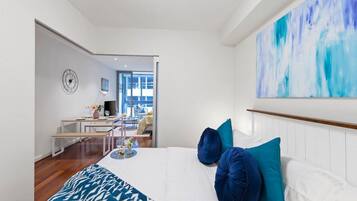 1 bedroom, desk, iron/ironing board, travel crib