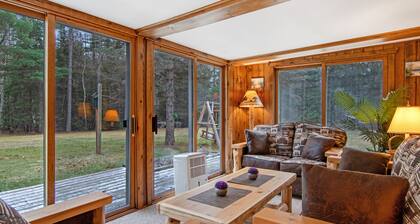 Lakefront Home with a Private Dock, Deck, Fireplace, Spacious Yard, & Playset