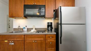 Fridge, microwave, stovetop, coffee/tea maker