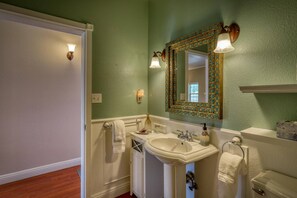 Shower, hair dryer, towels, shampoo