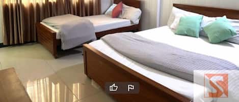 Chambre Triple Deluxe | Fer et planche à repasser, Wi-Fi gratuit, draps fournis