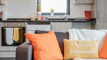 Apartment, 1 Queen Bed with Sofa bed | Living area | 30-inch TV with cable channels