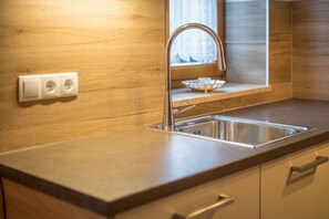 Réfrigérateur, four, plaque de cuisson, lave-vaisselle