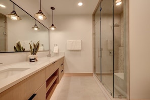 Bathtub, hair dryer, towels