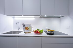 Family Apartment, 1 Bedroom (Boutique Apartment 3) | Private kitchen | Fridge, microwave, oven, stovetop - Boutique Apartment 3 (Lugano)