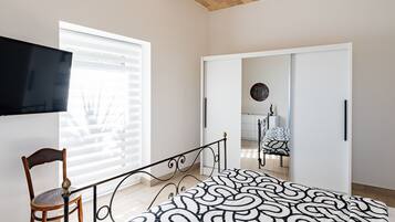 1 chambre, fer et planche Ă repasser, Wi-Fi gratuit, draps fournis