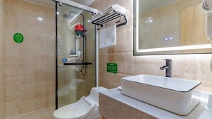 A modern bathroom with a glass-enclosed shower, a white sink, and a toilet. - GreenTree Inn (Hefei Datang International Honggang Metro Station) (Hefei)