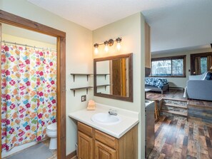 Bathtub, hair dryer, towels
