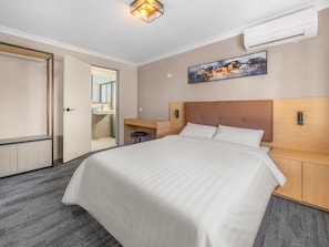 Family Studio Suite | 1 bedroom, desk, laptop workspace, blackout drapes