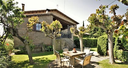 Tipical stone country house with pool and garden.