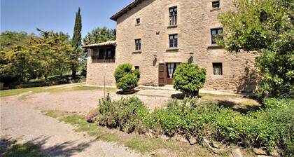 Tipical stone country house with pool and garden.