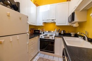 Condo, 2 Bedrooms | Private kitchen | Fridge, oven, coffee/tea maker, toaster