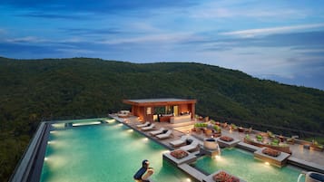 Outdoor pool, pool umbrellas, sun loungers