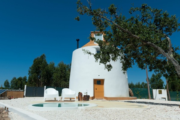 Escape to a restored 120-year-old windmill surrounded by nature, complete with a private plunge pool and panoramic countryside views. #WindmillStay #EcoRetreat #NatureEscape #PrivatePool #UniqueStay #Portugal #PT #SobralDaAbelheira #Mafra