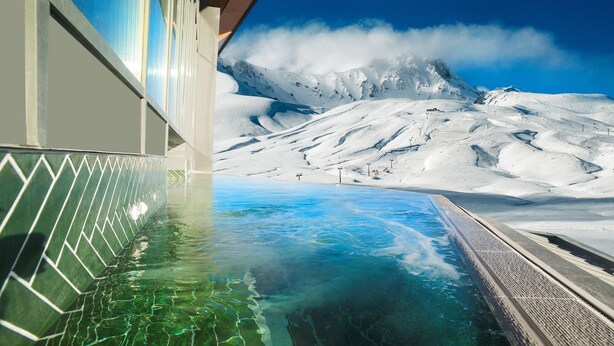 A clear view of a swimming pool with a mountain landscape in the background. - Radisson Blu Hotel, Mount Erciyes (Kayseri)