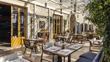 Breakfast, lunch, dinner served; Eastern European cuisine, sea views