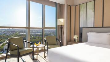 Premium bedding, down comforters, in-room safe, desk