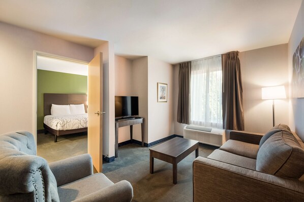 SureStay Plus SeaTac double queen room with two queen beds, ideal for families