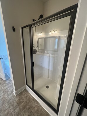 Combined shower/tub, hair dryer, towels, soap