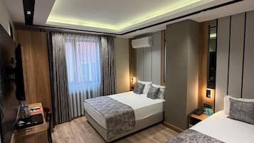 City-Dreibettzimmer | Kostenloses WLAN, Bettwäsche