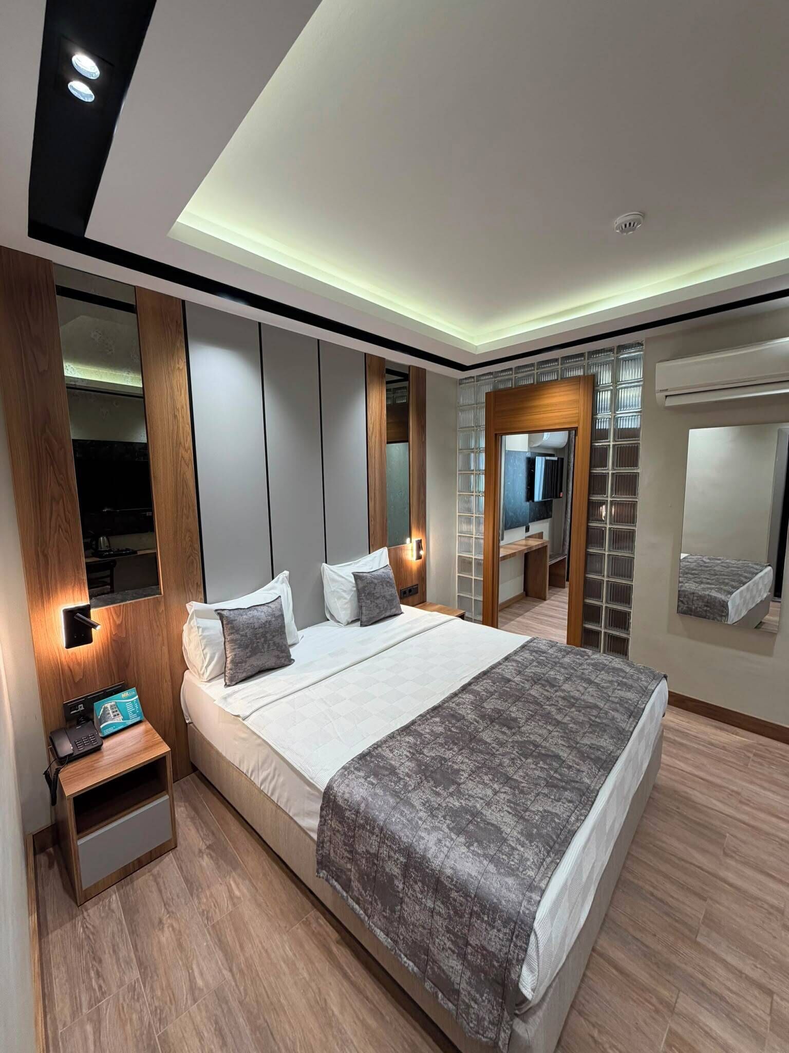 Suíte urbana | Wi-Fi de cortesia, roupa de cama