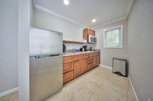 Full-size fridge, microwave, stovetop, toaster