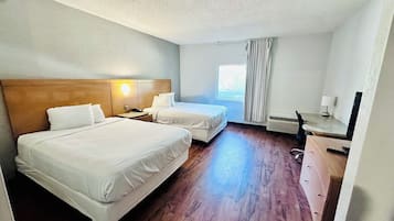 Desk, laptop workspace, free WiFi, bed sheets