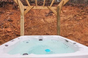 Bañera de hidromasaje al aire libre