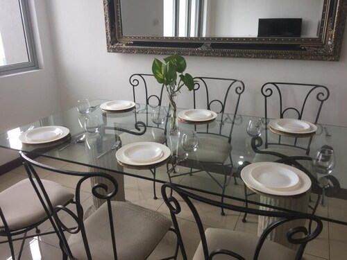 The outdoor entertainment by the pool