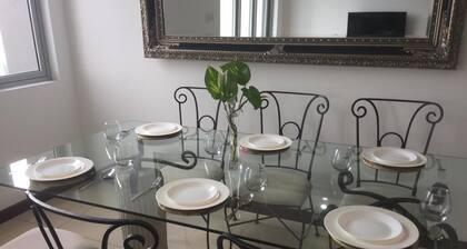 The outdoor entertainment by the pool