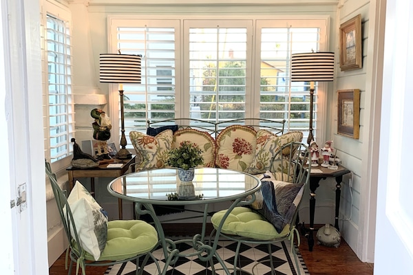 Enjoy a meal, a book or listening to music in this beautiful relaxing sunroom.