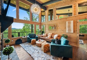 Älytelevisio, takka, pöytätennispöytä, kirjoja