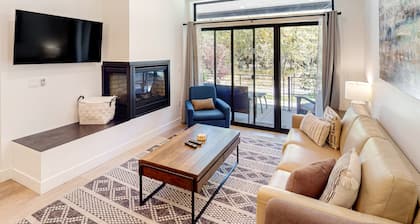 Ground-Floor, Riverfront Getaway with a Gas Fireplace, WiFi, & Furnished Patio