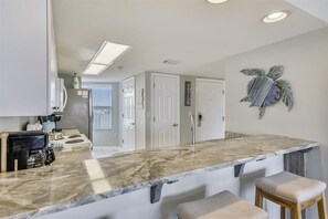 Private kitchen - Seacrest 710 is 2 BR Top Floor Gulf Side unit - Beautifully decorated by RedAwning (Fort Walton Beach)