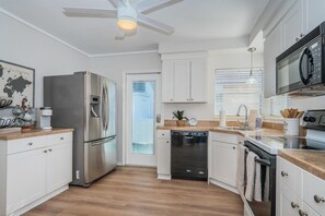 Fridge, microwave, oven, stovetop - The Seagull beach cottage is steps to the beach. (Redington Shores)