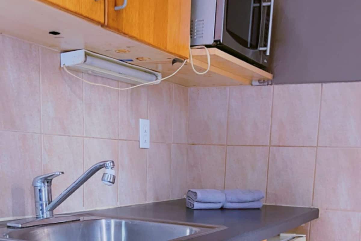 Mini-fridge, microwave, paper towels