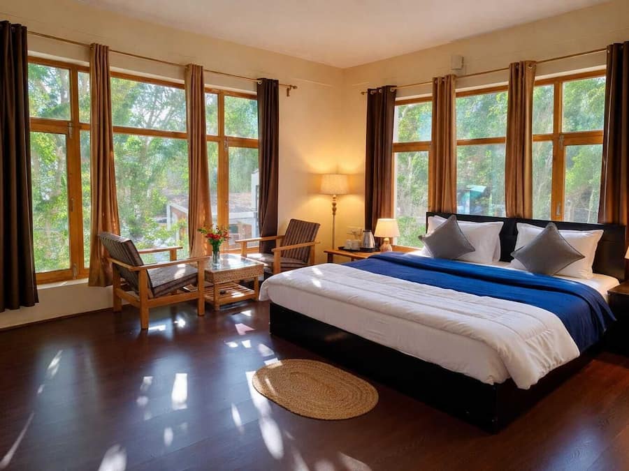 Habitación Deluxe | Ropa de cama de alta calidad y edredones de plumas