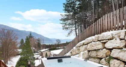 Appartement de vacances "Wellness Lodge Chicca" avec vue sur le lac, sauna et Wi-Fi