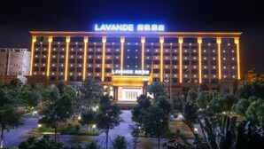 A hotel with a prominent sign reading "LAVANDE" and a well-lit entrance. - Lavande Hotel (Dongguan Chang'an Fuhu) (Dongguan)