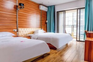 A hotel room with two beds, wooden paneling on the walls, a large window with curtains, and a balcony. - Sihui Aikeyou Hotel (Sihui Plaza) (Sihui)