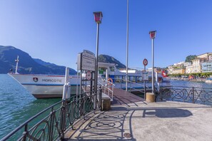 Stroll along the waterfront promenade and enjoy the views of the calm sea.