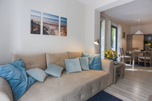 Standard Apartment | Living area | 40-inch flat-screen TV with cable channels, TV