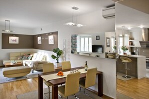 Business-Apartment | Wohnzimmer | 40-Zoll-LCD-Fernseher mit Kabelempfang, Fernseher