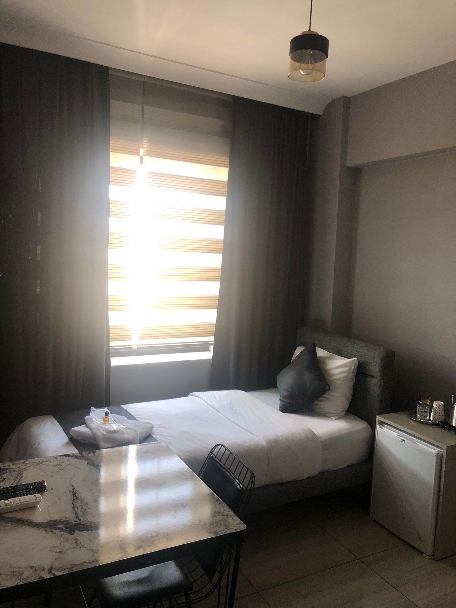 standard single room | premium bedding, down duvets, minibar, desk