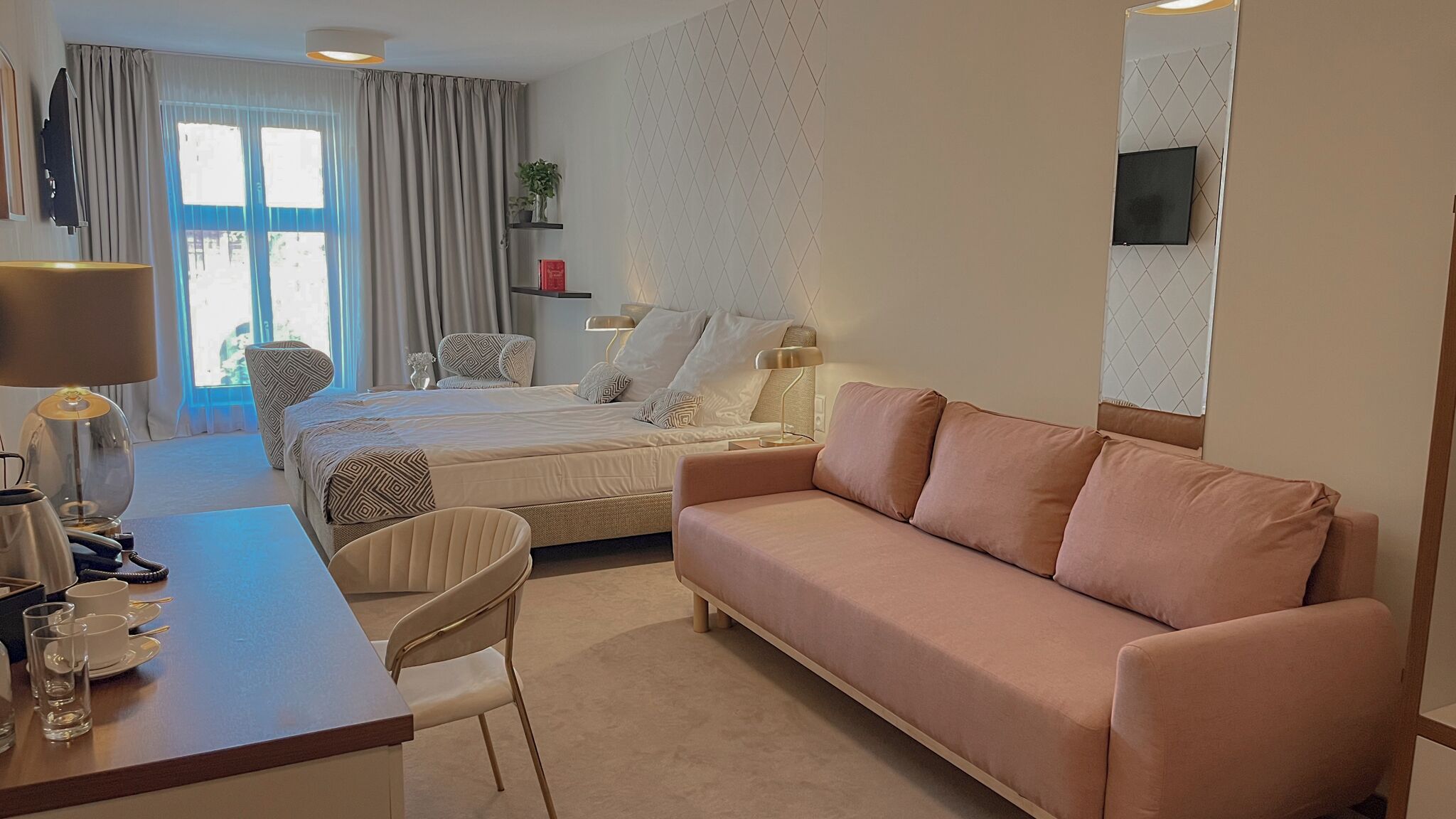 comfort room | 1 bedroom, minibar, in-room safe, desk