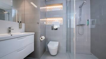 Shower, free toiletries, hair dryer, towels